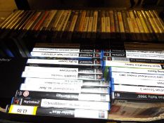 A collection of in excess of 60 computer games to include Playstation 2, PC games,