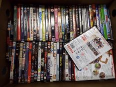 A collection of approximately 70 various DVDs