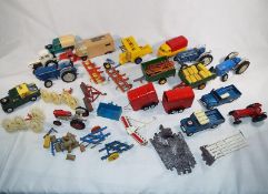 A group of farm equipment, Britains, Dinky and Corgi to include tractors, disc harrows, balers,
