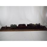 Model railways - an early 20th century O gauge display comprising 4-4-2T tank locomotive,