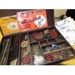 Meccano - a wooden hinge-topped case containing a collection of early Meccano with manuals and