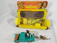 A Corgi Toy Gift Set 7 from the popular TV programme ‘Daktari’ comprising Land Rover in black zebra