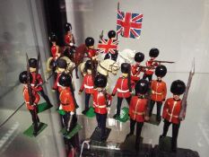 Britains diecast soldiers (and similar) - a collection of seventeen painted diecast model guardsmen