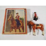 Queen Elizabeth II on horseback, sidesaddle 'trooping the colour',