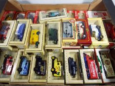 A collection of approximately thirty diecast model motor vehicles, predominantly Days Gone,