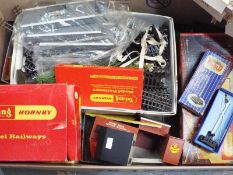 Model railways - a box containing a collection of OO gauge scenics, buildings, platform,