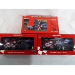 Minichamps Motorbikes - three diecast models comprising Ducati 996 Superbike World Champion 1999