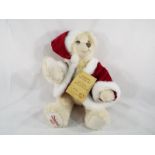 Hermann - a Christmas Bear, mohair, growler and dressed in traditional Christmas style,