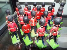 Britains diecast soldiers - a collection of twenty painted diecast model Grenadier Guards and a