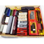 Model railways - approximately 23 OO gauge items of goods rolling stock and two Royal Mail coaches,