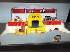 A toy Zoo to include many wild animals,