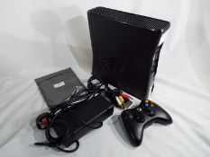 X-box - an X-box 360 computer with mains leads,