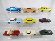 Dinky Toys - nine models comprising a Buick Riviera, Vauxhall 101, Packard 132,