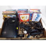 A Sony Playstation 3 with controllers, camera,