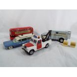 Dinky Toys - a Brinks Armoured Car with two crates # 275, a Routemaster Bus 289,