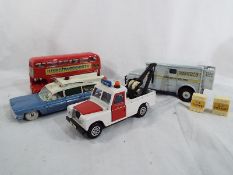 Dinky Toys - a Brinks Armoured Car with two crates # 275, a Routemaster Bus 289,