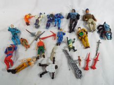 A collection of various action figures t