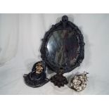 Gothic / Halloween interest - a mixed lot of Novelty Skulls to include a wall mirror,