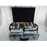 XBox - a good quality flight case containing approximately 45 XBox games