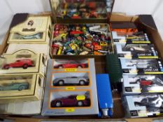 A collection of approximately 24 diecast model motor vehicles to include Days Gone, Welly,