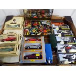 A collection of approximately 24 diecast model motor vehicles to include Days Gone, Welly,