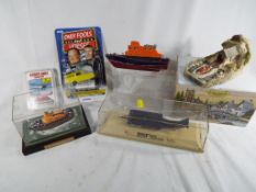 A mixed lot of good diecast models to include a Thrust Super Sonic Car,