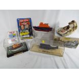 A mixed lot of good diecast models to include a Thrust Super Sonic Car,