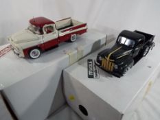 Two Danbury Mint Precision Models comprising 1957 Dodge Sweptside D100 and 1942 Ford Pickup,