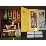 A collection of dressed dolls, predominantly boxed,