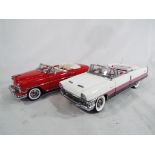 Two Franklin Mint Precision Models comprising 1954 Chevrolet Bel Air and 1955 Packard Caribbean,