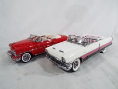 Two Franklin Mint Precision Models comprising 1954 Chevrolet Bel Air and 1955 Packard Caribbean,