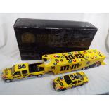 A Ernie Irvan NASCAR M&M's show trailer and car collection by Brookfield Collectors Guild,