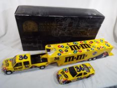 A Ernie Irvan NASCAR M&M's show trailer and car collection by Brookfield Collectors Guild,