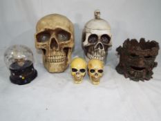 Gothic / Halloween interest - a collection of predominantly novelty Skulls to include a money bank,