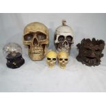 Gothic / Halloween interest - a collection of predominantly novelty Skulls to include a money bank,