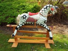 A rocking horse by Collinson, ca 1940's - 1950's,