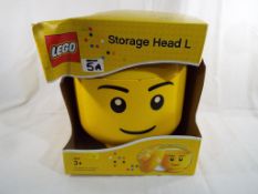 Lego - a large storage head Lego container new and unused with original packaging Est £15 - £25