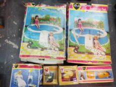 Sindy - two Pedigree Sindy swimming pools, boxed and a Sindy bath, bedside table and chair,