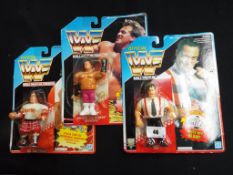 WWF (World Wrestling Federation by Hasbro) - three action figures comprising Rowdy Roddy Piper