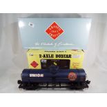 Model railways - Aristo Craft Trains - a twin axle Boxcar # 40301 and a Singledome Chemical Tank