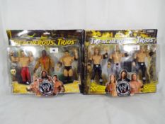 WWE (World Wrestling Entertainment action figures by Jakks Pacific) - two Treacherous Trio's triple