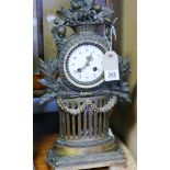 French striking mantel clock in decorative flower mounted gilt plaster case