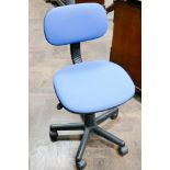 Blue upholstered typists office chair