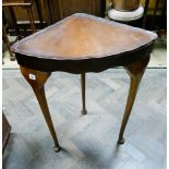 Reproduction mahogany corner table on cabriole style legs