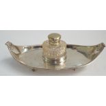 Edwardian silver boat shaped ink stand with cut glass inkwell,