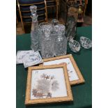 Pair of painted on glass framed panels, decanters,