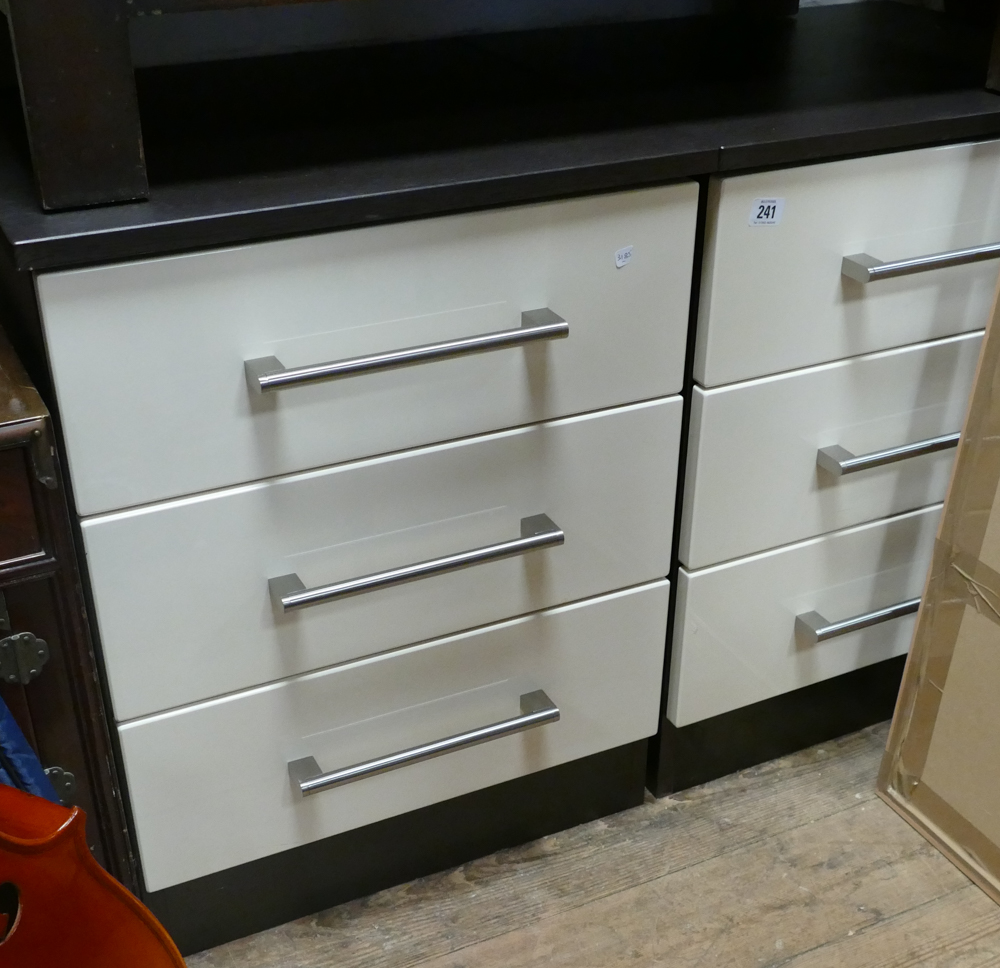 Pair of modern cream gloss and dark wood effect cabinets each fitted 3 drawers