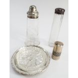 Silver circular butter dish with cut glass liner, silver topped sugar shaker,