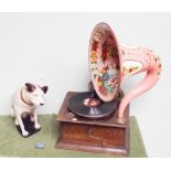 Oak table model wind up gramophone with decorative painted horn together with model of HMV dog c