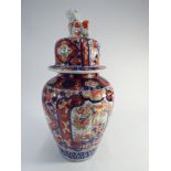 19th century Imari vase and cover with dog of fo finial.